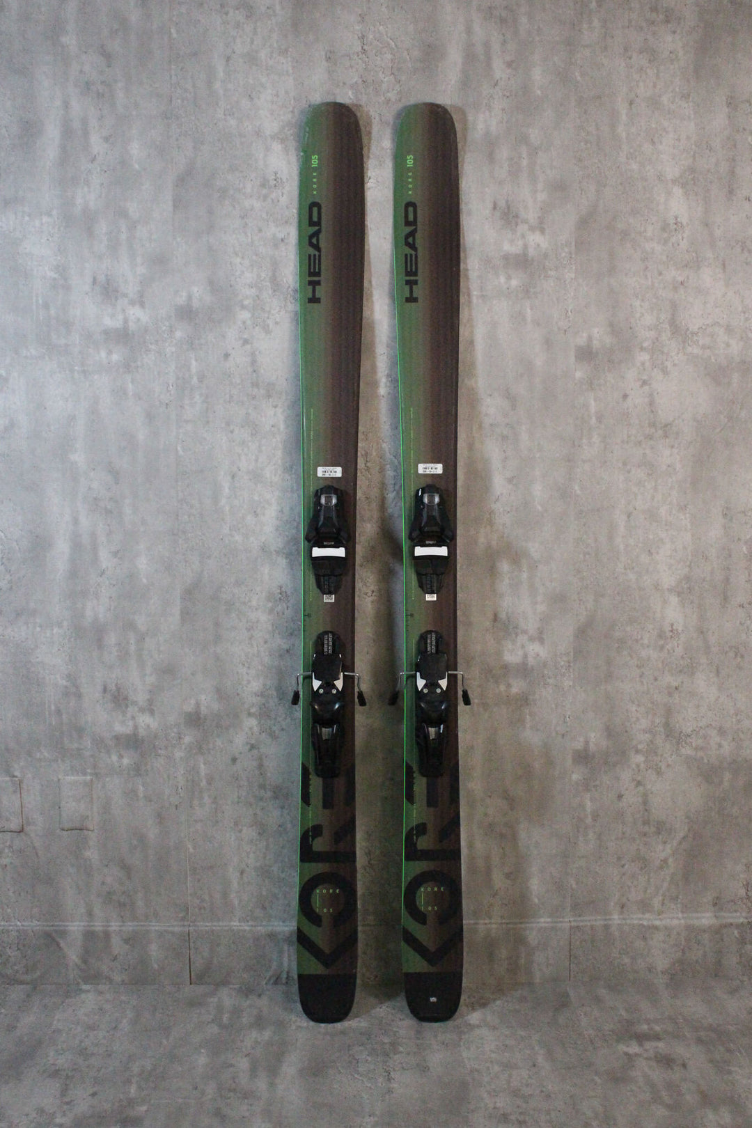 The Head Kore 105 Skis offer downhill performance and backcountry versatility with Multilayer-Carbon Sandwich Cap Construction for feedback and stiffness. Lightweight and reliable, they excel in all conditions. Available as used demo skis online or at Switchback Sports in Park City.